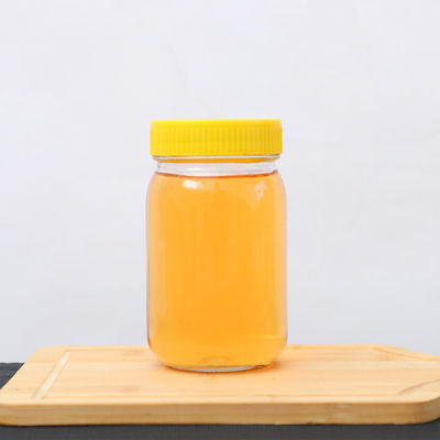 kupować Wysokiej jakości słoik z miodem i łyżka Ośmiokątna butelka szklana 375 ml 750 ml produkcja online