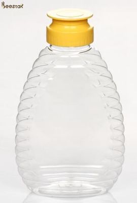 kupować Hurtowa cena fabryczna 375 ml specjalnego plastikowego słoika na miód i łyżek plastikowych butelek na miód produkcja online