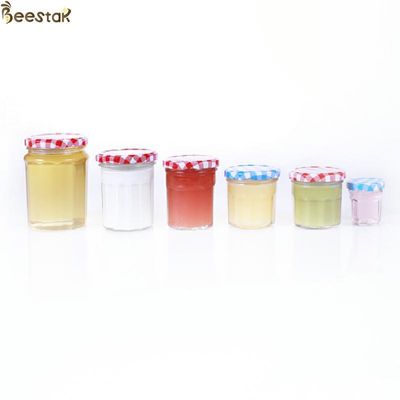 kupować 150 ml 200 ml 250 ml 380 ml słoik miodu i łyżka szerokie usta z cienką śrubą metalową pokrywką produkcja online