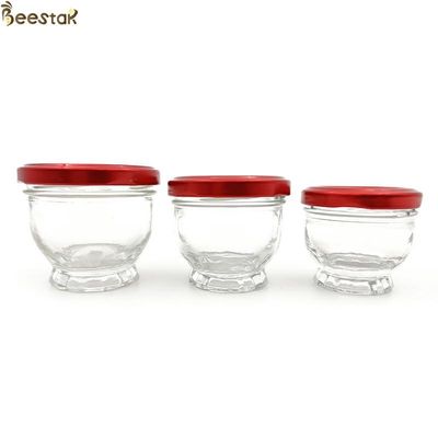 kupować 50ml 75ml 100ml Mini szklane słoiki miodu Szklana butelka miodu produkcja online